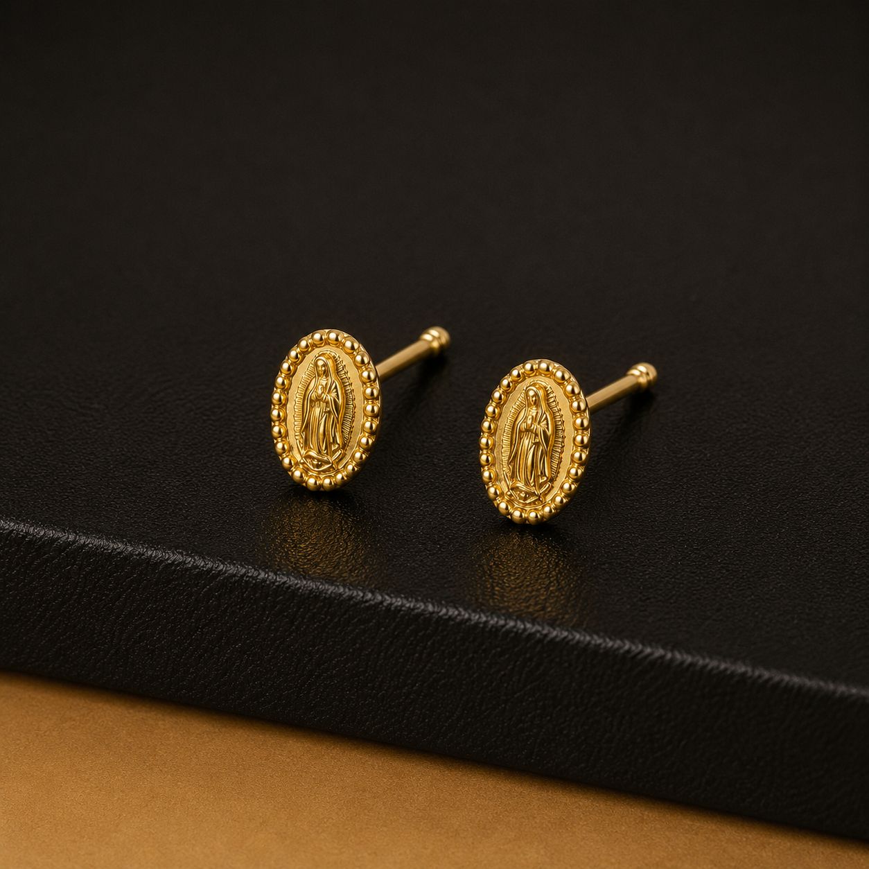 Oval gold Virgin of Guadalupe medallion stud earrings